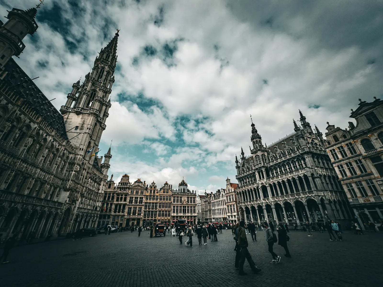 Historic guildhalls and people enjoying the Grand Place in Brussels, Belgium